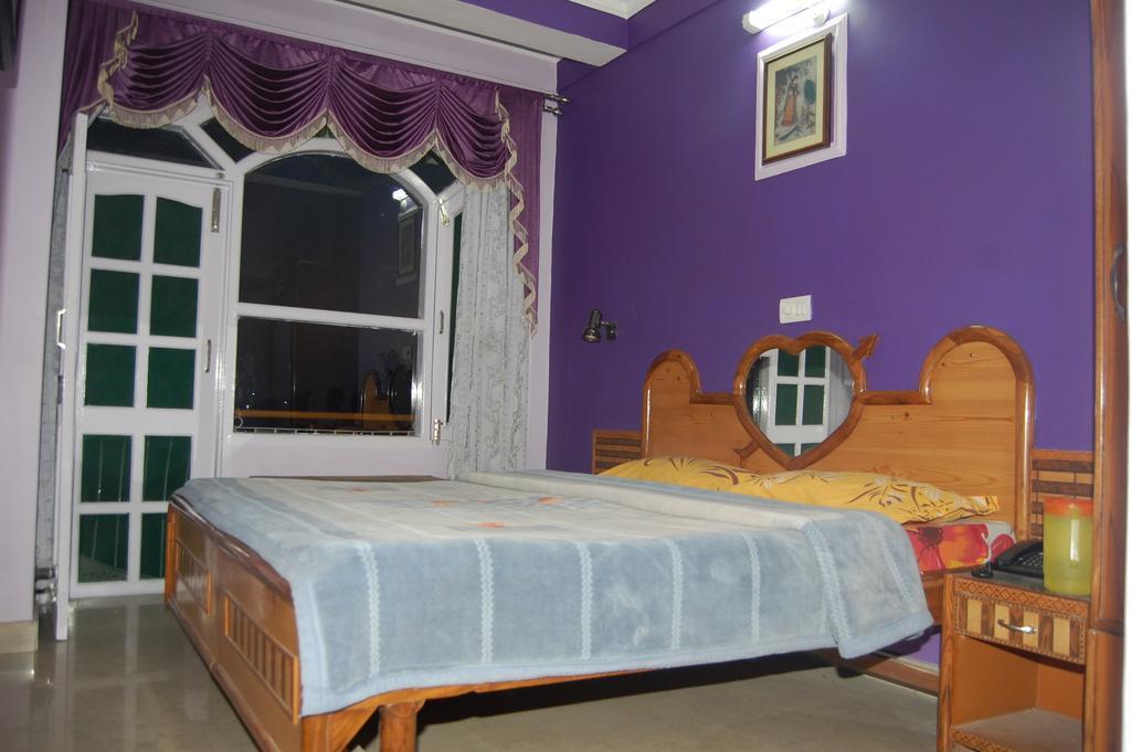 Hotel Ashish Inn Kandāghāt Pokoj fotografie