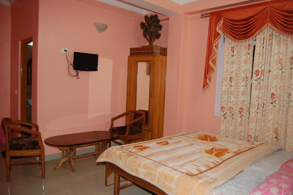 Hotel Ashish Inn Kandāghāt Pokoj fotografie