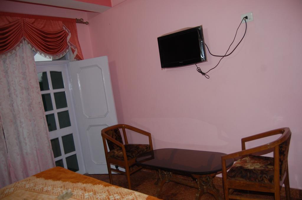 Hotel Ashish Inn Kandāghāt Pokoj fotografie